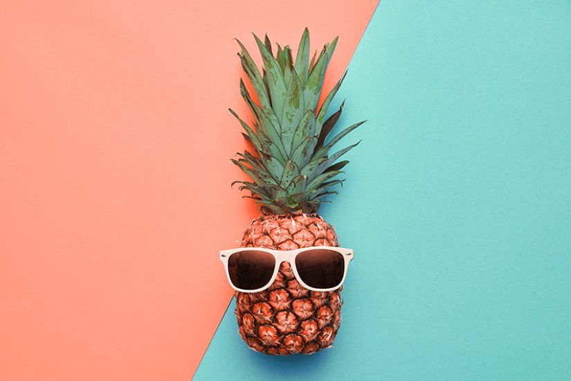 Fashion Hipster coral Pineapple in sunglasses. Stylish Trendy Accessories. Bright Color. Tropical Minimal concept. Creative Art fashionable concept. Just feel this summertime